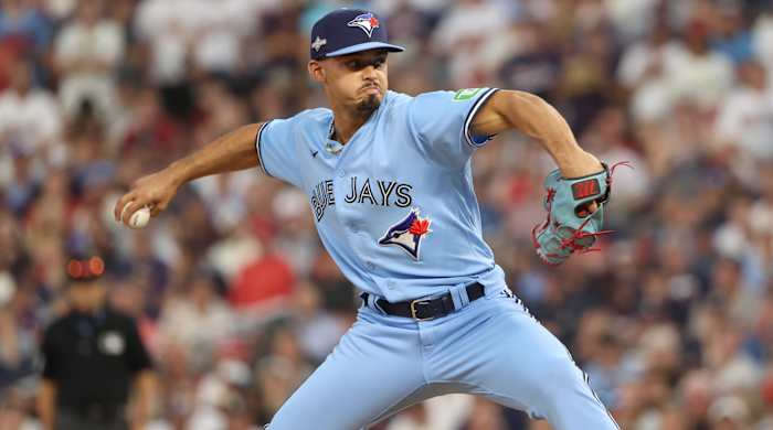 Toronto Blue Jays relief pitcher Jordan Hicks (12) pitches in the in the eighth inning of a game against the Minnesota Twins.